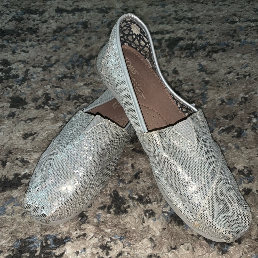Toms Silver Glitter slip ons size W9